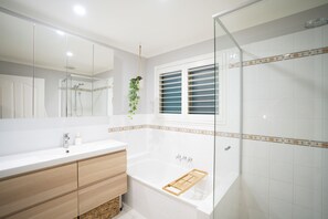 Shower, hair dryer, towels, soap