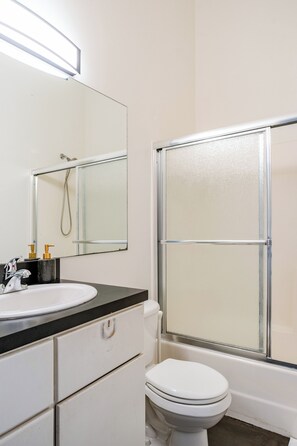 Eco-friendly toiletries, hair dryer, towels, soap