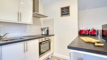 Fridge, microwave, toaster, cookware/dishes/utensils