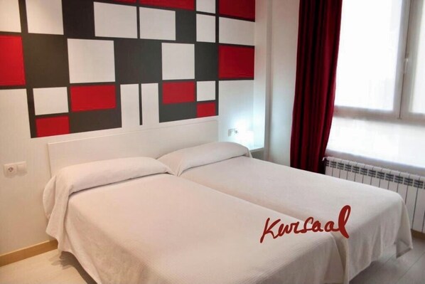 Twin Room, Balcony, Courtyard View | In-room safe, iron/ironing board, free WiFi