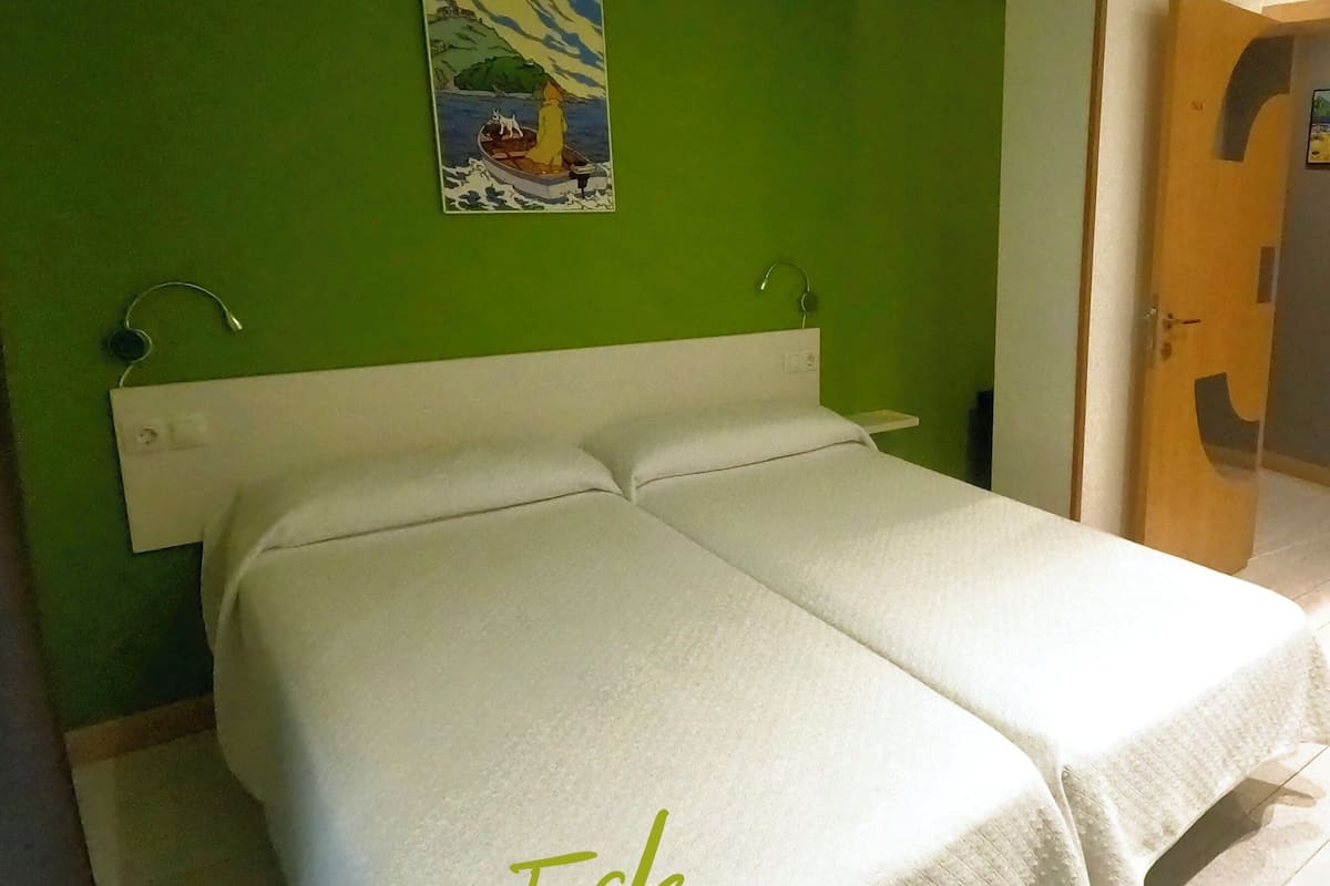 Twin Room, Balcony, Courtyard View | In-room safe, iron/ironing board, free WiFi