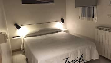 Economy Double Room | In-room safe, iron/ironing board, free WiFi