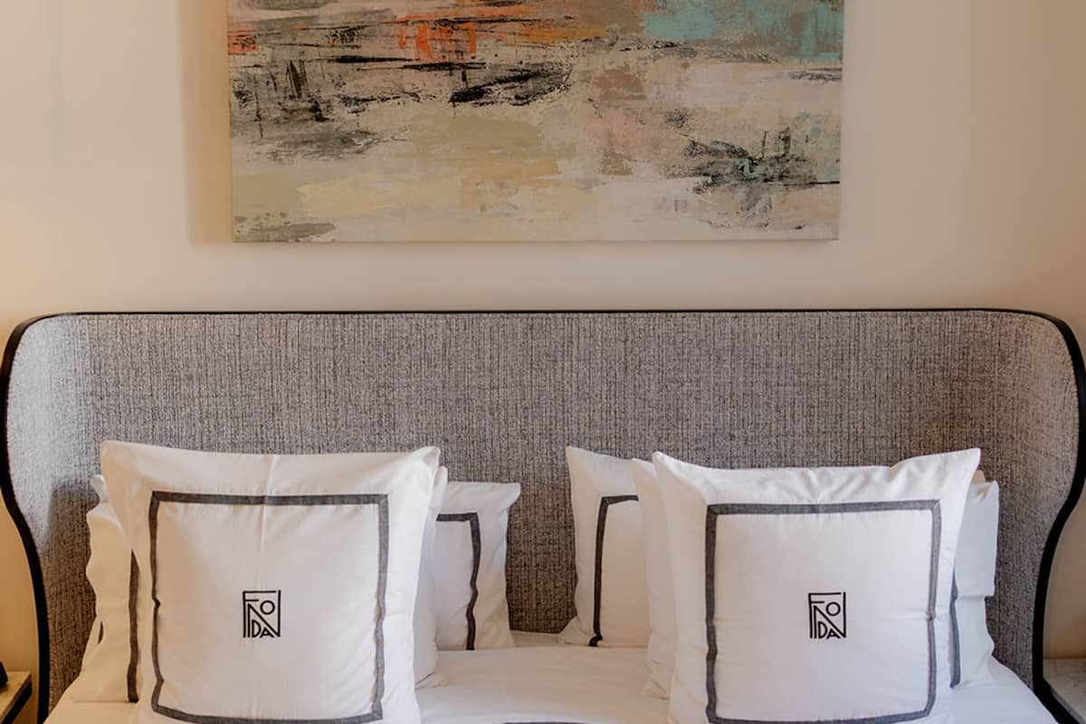 Egyptian cotton sheets, premium bedding, minibar, in-room safe