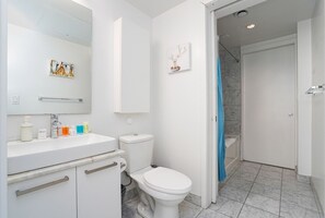 Shower, hair dryer, towels