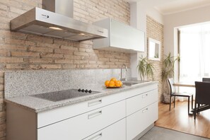 Fridge, microwave, stovetop, coffee/tea maker
