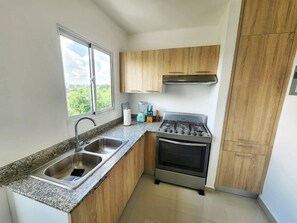 Apartment, Multiple Beds | Private kitchen