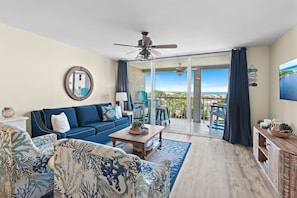 TV, books - 2BR Family-Friendly Condo with Balcony + 3 Pools & Bikes | Magnolia House 211 (Destin)