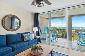 TV, books - 2BR Family-Friendly Condo with Balcony + 3 Pools & Bikes | Magnolia House 211 (Destin)