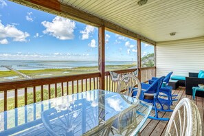 Outdoor dining - Blue Chair Bay | South Main Bayfront w/ 2-Level Screened Porches, Sunset Views & Shared Pier (Chincoteague Island)