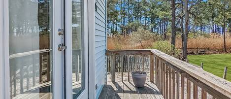 Step out onto the deck and enjoy the serene surroundings.