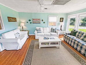 TV, fireplace, books - Mermaid Crossing - Pet friendly; Waterfront w/ Dock! (Chincoteague Island)