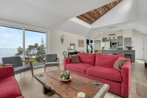 TV, fireplace, offices - Poole's Cove | Waterfront Main Street Retreat Fully Renovated w/ Rooftop Lounge & Artistic Charm (Chincoteague Island)