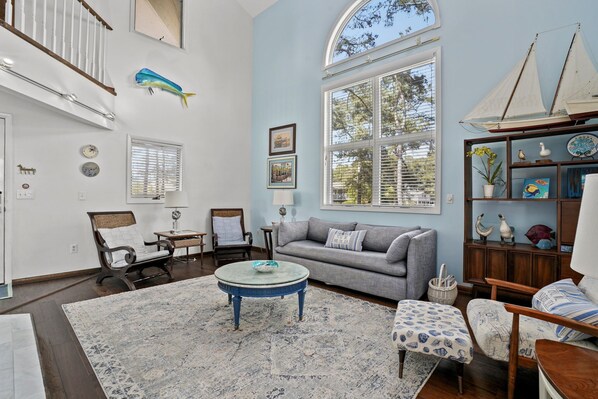 TV, fireplace - Sunshine Daydream | Oyster Bay Canal Waterfront w/ Multiple Porches, Water Views & Dog Friendly (Chincoteague Island)