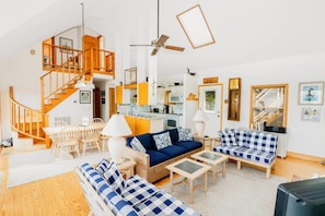TV, fireplace - Windshadow | Bayfront Sunsets w/ Screened Gazebo, Dock, Fireplace, Sky Deck Porch & Pet Friendly (Chincoteague Island)