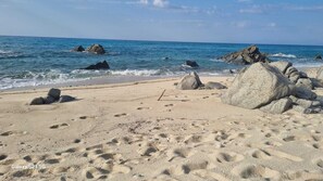 On the beach, sun loungers