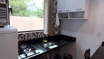 Fridge, microwave, stovetop, cookware/dishes/utensils