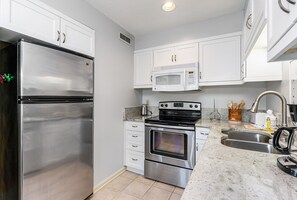 Fridge, oven, coffee/tea maker, toaster