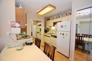 Condo, 2 Bedrooms | Private kitchen | Fridge, coffee/tea maker, toaster