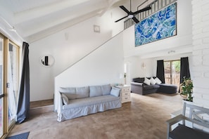 TV, fireplace, table football - Oceanview Loft by Peppy Beach Retreats® (6 Adults), Oceanview Loft (Peppermint Grove Beach)