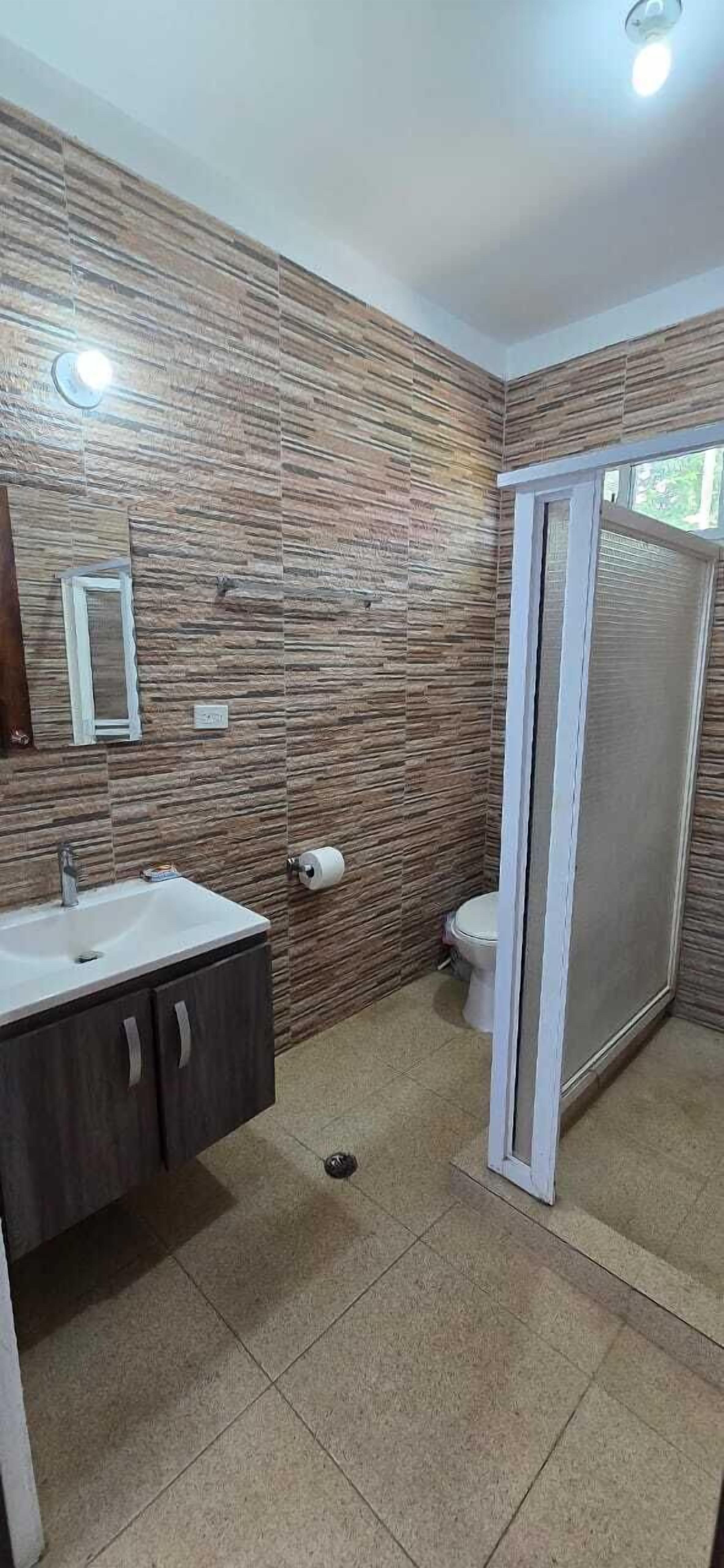 Villa | Bathroom | Shower, rainfall showerhead, towels, toilet paper