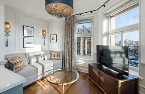 50-inch Smart TV with digital channels, TV, iPad