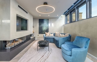 RÃŒGH Penthouse Suite | Living area | 50-inch Smart TV with digital channels, TV, iPad