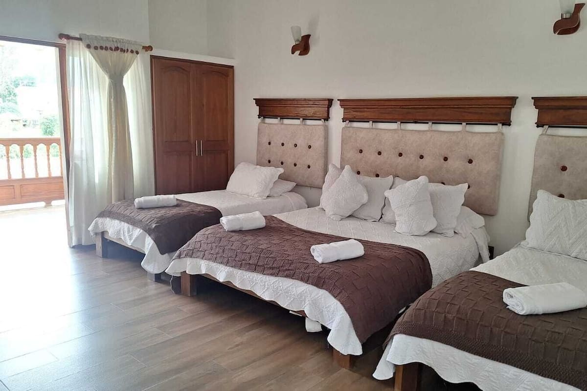 Deluxe Quadruple Room | Premium bedding, down duvets, free WiFi, bed sheets