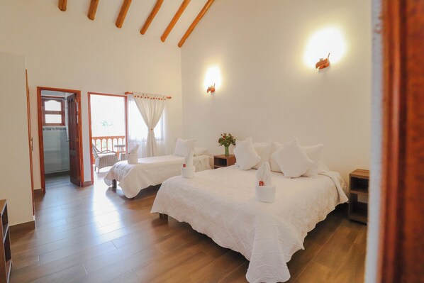 Deluxe Triple Room | Premium bedding, down duvets, free WiFi, bed sheets - Hotel las Palmas (Villa de Leyva)