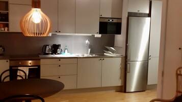 Apartment, 1 Queen Bed | Private kitchen | Fridge, microwave, oven, stovetop