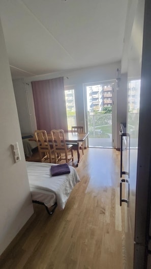 Apartamento, 2 camas de solteiro | 1 quarto, Wi-Fi de cortesia, roupa de cama