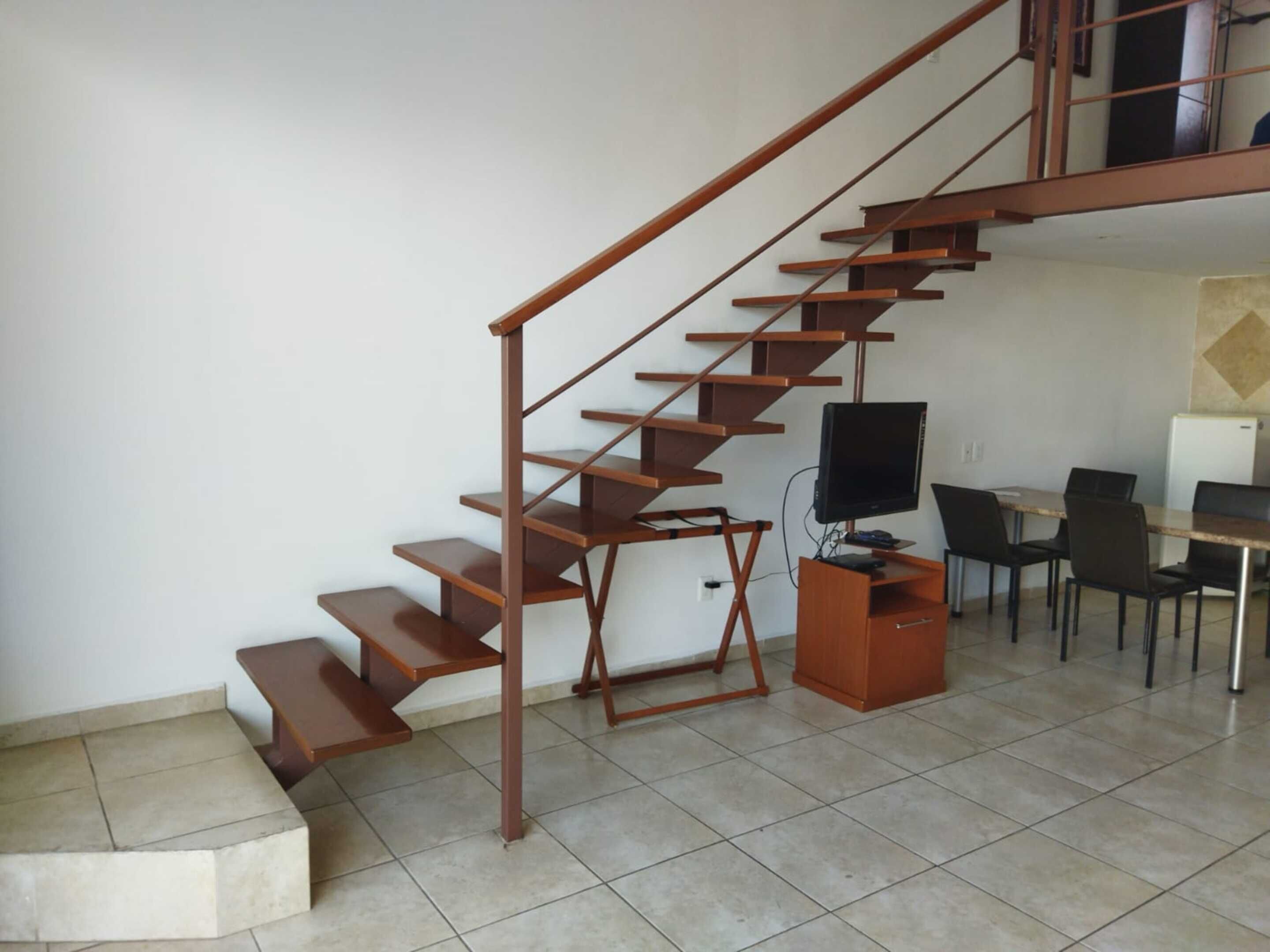 Loft Deluxe | Área de sala de estar | Televisión de pantalla plana 