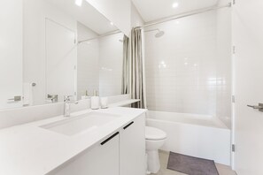 Hair dryer, towels, soap, shampoo