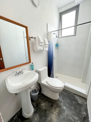 Shower, hair dryer, towels, soap