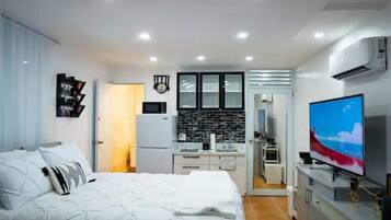 1 chambre, fer et planche à repasser, Wi-Fi gratuit, draps fournis