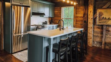 Fridge, microwave, cookware/dishes/utensils