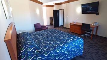 Habitación Deluxe | Edredón, camas con pillow-top y caja de seguridad en la habitación