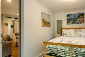 1 bedroom, desk, iron/ironing board, travel cot