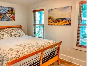 1 bedroom, desk, iron/ironing board, travel crib