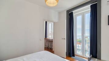 2 dormitorios, tabla de planchar con plancha, cuna de viaje y wifi