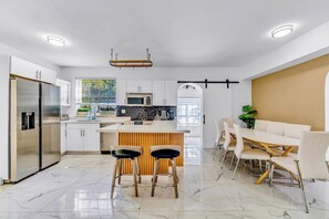 Fridge, oven, coffee/tea maker, high chair