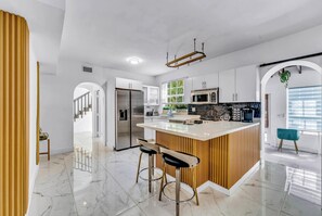 Fridge, oven, coffee/tea maker, high chair