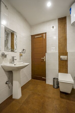 Shower, rainfall showerhead, towels, soap