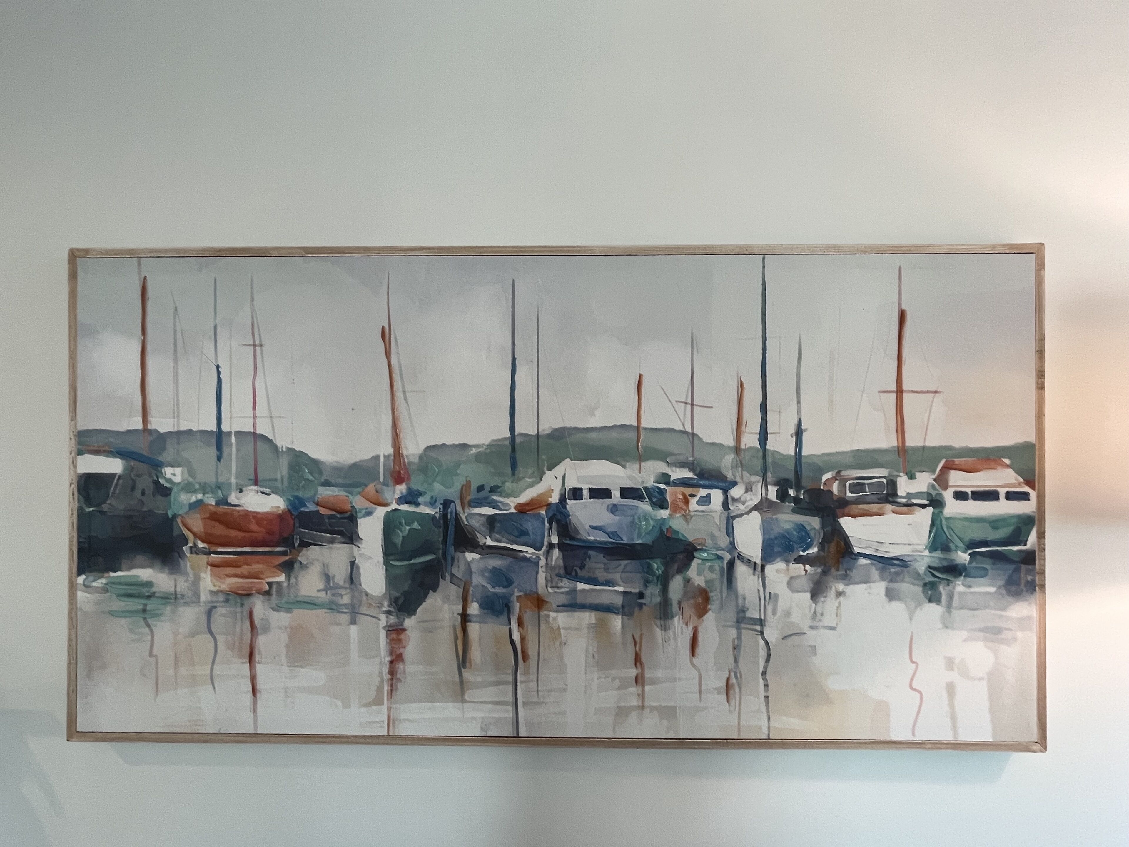 A painting of boats on water.