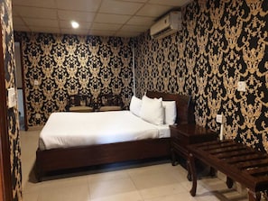 Desk, iron/ironing board, bed sheets - Grand One Hotel Faisal Town (Lahore)