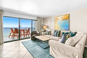 Enjoy ocean views from the balcony through the large sliding glass door.