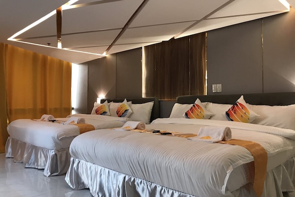 Family Room | Laptop workspace, bed sheets