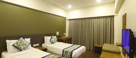 Premium bedding, laptop workspace, blackout curtains, free WiFi