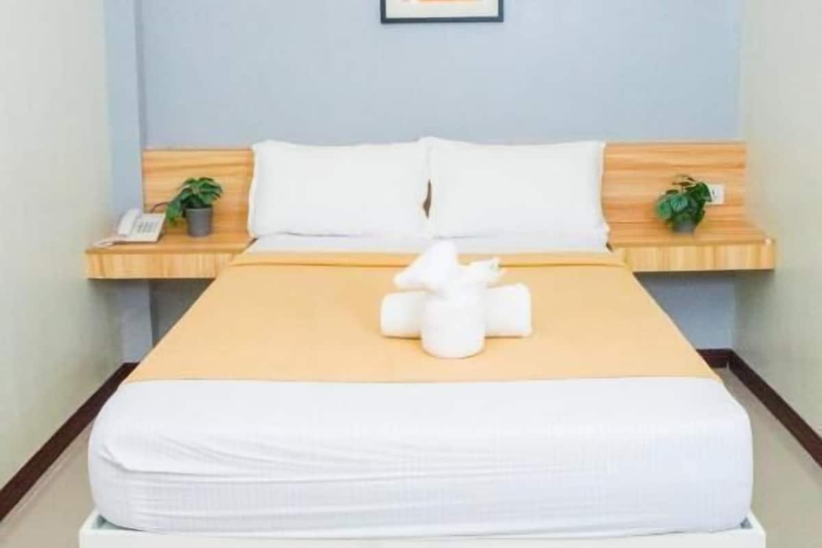 Chambre Standard | Matelas mémoire de forme, Wi-Fi gratuit, draps fournis
