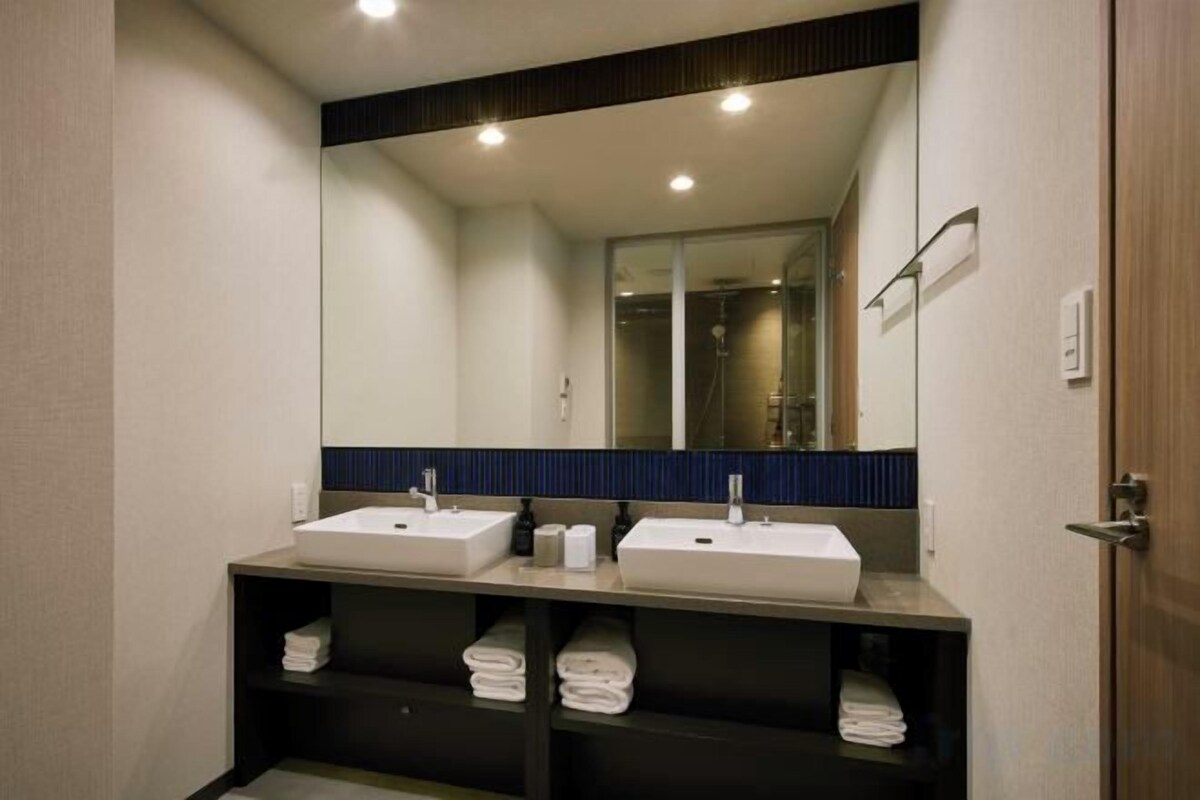 Bathroom | Separate bathtub and shower, hair dryer, slippers, bidet