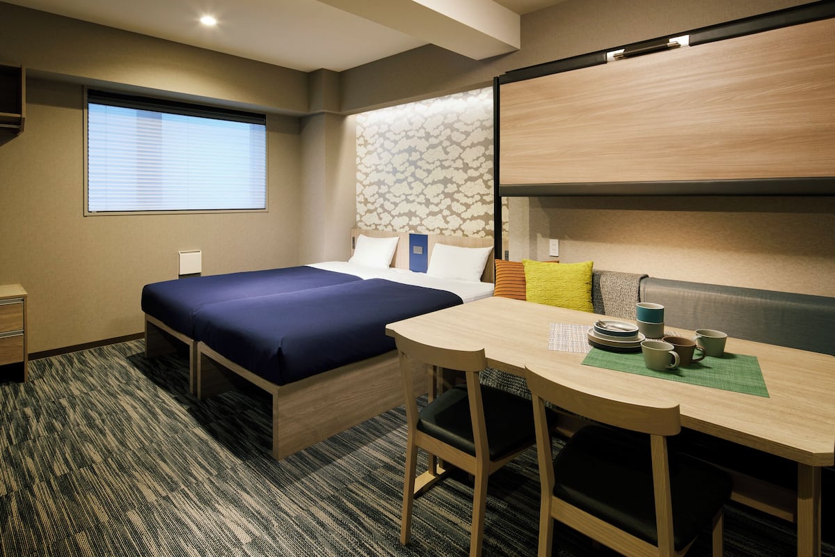 Standard Apartment | 1 bedroom, down comforters, in-room safe, blackout drapes